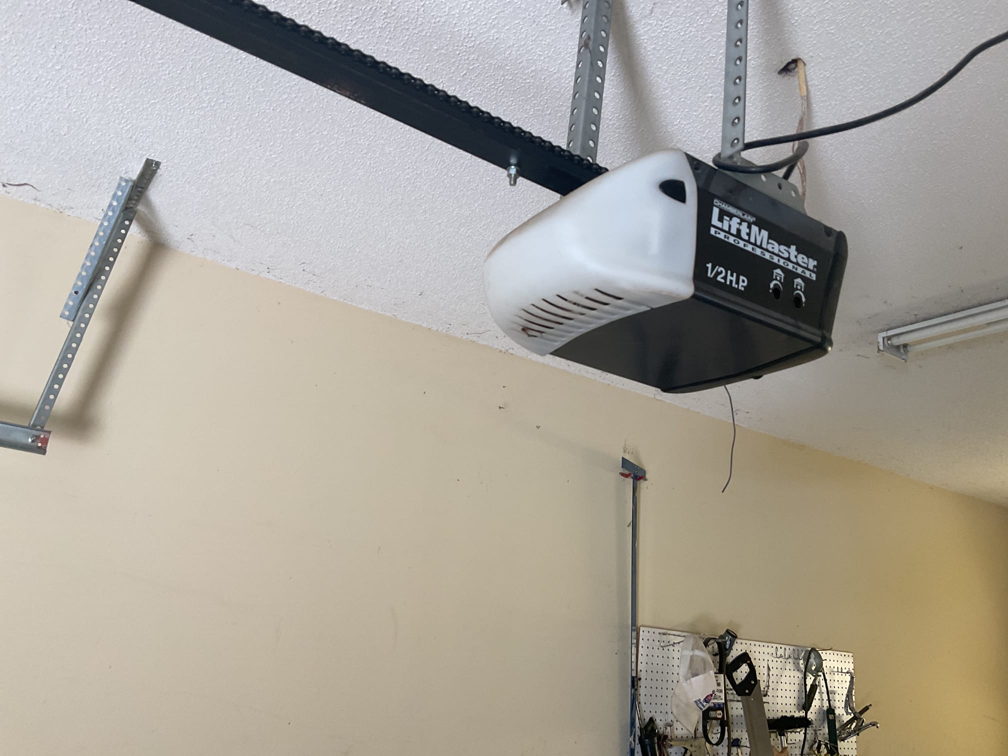 Garage door opener and rail reviewed as part of a tune-up