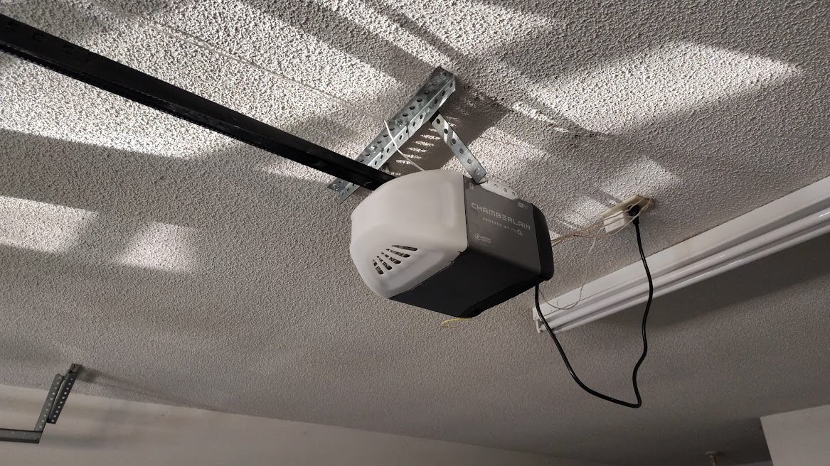 Chamberlain garage door opener mounted to a garage ceiling